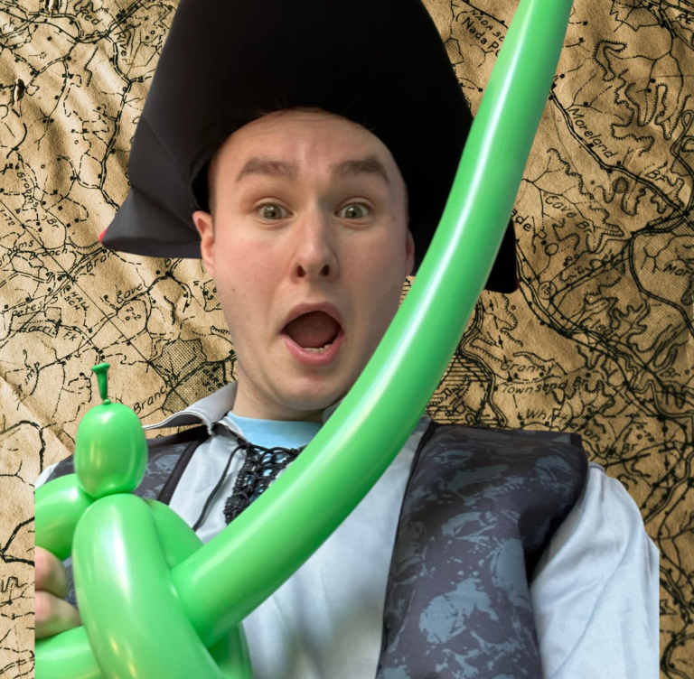 K-pop kids' party Young woman with a purple headband and orange jacket against a blue background.