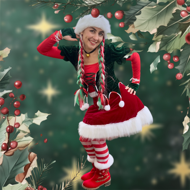 Children enjoying a fun-filled birthday party with TipTopParty. A girl in a festive outfit with braids, posing among holiday greenery and berries.